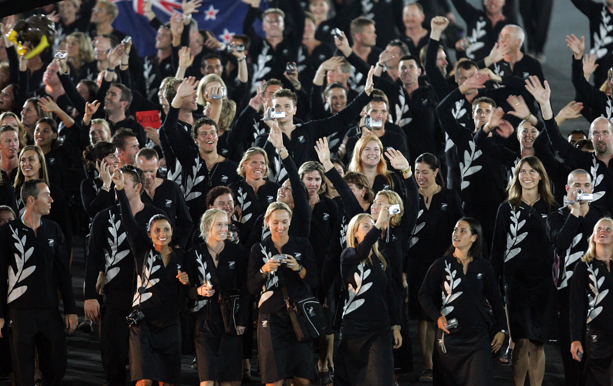 ATHENS - AUGUST 13:  The delegation from New Zealand walk during the parade of nations, part of the opening ceremonies for the Athens 2004 Summer Olympic Games on August 13, 2004 at the Sports Complex Olympic Stadium in Athens, Greece.  (Photo by Stuart Franklin/Getty Images)