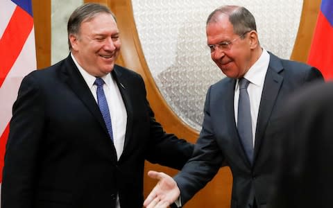 Mike Pompeo, the US secretary of state, left, and Sergey Lavrov, the Russian foreign minister, in Sochi - Credit: Pavel Golovkin/Pool via REUTERS