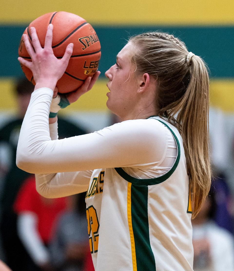 Lansdale Catholic's Grace McDonough (22) from the free-throw line against Archbishop Wood during their girls' basketball game in Lansdale on Tuesday, Jan. 23, 2024.

Daniella Heminghaus | Bucks County Courier Times