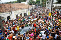 Revellers take part in an annual block party known as "Ceu na Terra" (Heaven on Earth), one of the many carnival parties to take place in the neighbourhoods of Rio de Janeiro, Brazil February 25, 2017. REUTERS/Ricardo Moraes