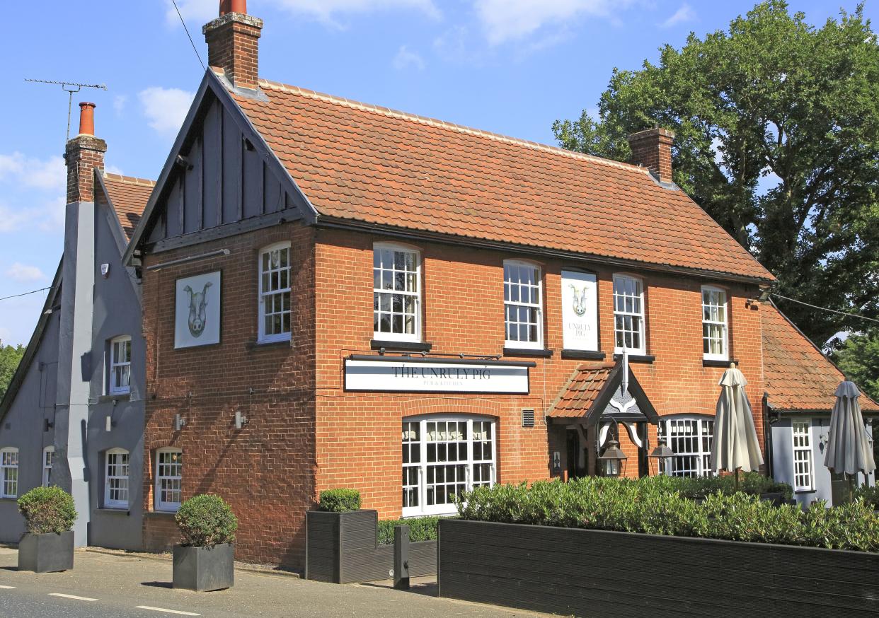 The Unruly Pig pub restaurant, Bromeswell, Suffolk, England, UK. (Photo by: Geography Photos/Universal Images Group via Getty Images)