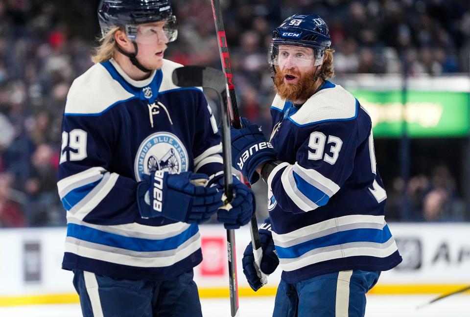 Columbus Blue Jackets right wing Jakub Voracek (93) talks to left wing Patrik Laine (29) at the start of a power play during the first period of the NHL hockey game against the Minnesota Wild at Nationwide Arena in Columbus on March 11, 2022.