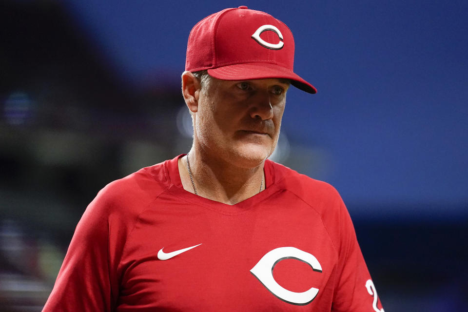 Cincinnati Reds manager David Bell walks to the dugout during the seventh inning of the second baseball game of a doubleheader against the Pittsburgh Pirates, Thursday, July 7, 2022, in Cincinnati. (AP Photo/Jeff Dean)