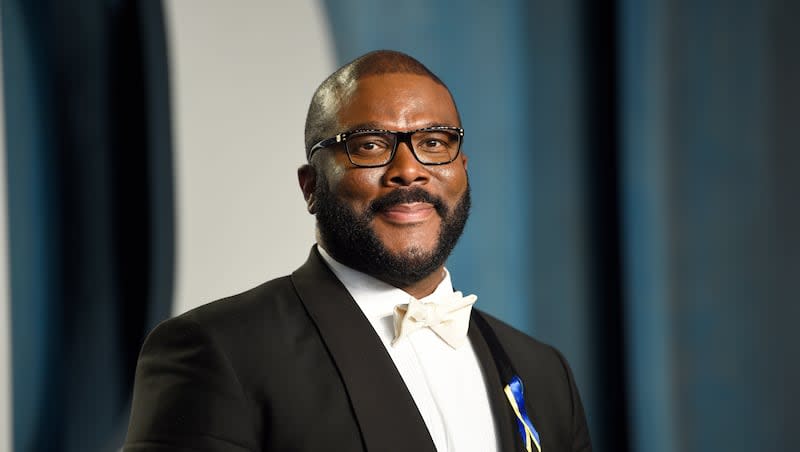 Tyler Perry arrives at the Vanity Fair Oscar Party in Beverly Hills, Calif., on March 27, 2022. Netflix recently made a deal with Perry and DeVon Franklin to produce multiple new films and shows centered on faith.