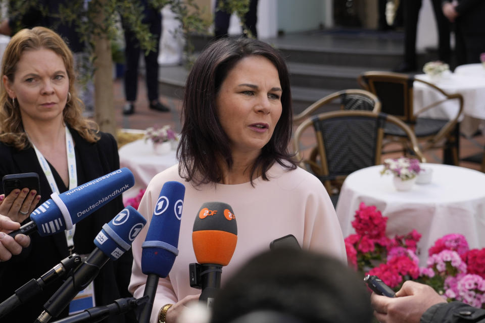 German Foreign Minister Annalena Baerbock talks to reporters during the G7 Foreign Ministers meeting on Capri Island, Italy, Thursday, April 18, 2024. (AP Photo/Gregorio Borgia)