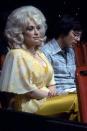 <p>While she may not be known as much for wearing yellow over white or pink, this has been a popular color choice for the singer over the years. It was during the '80s that Parton began to develop her vibrant, larger-than-life style that matched her lovable persona.</p>