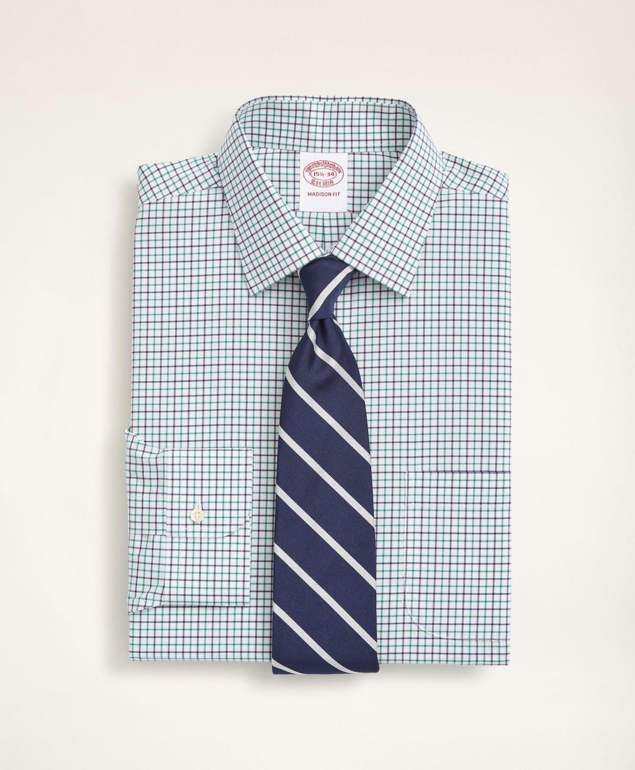 <p><a href="https://go.redirectingat.com?id=74968X1596630&url=https%3A%2F%2Fwww.brooksbrothers.com%2Fstretch-madison-relaxed-fit-dress-shirt%252C-non-iron-poplin-ainsley-collar-tattersall%2FME04448.html&sref=https%3A%2F%2F" rel="nofollow noopener" target="_blank" data-ylk="slk:Shop Now;elm:context_link;itc:0;sec:content-canvas" class="link rapid-noclick-resp">Shop Now</a></p><p>Stretch Madison Relaxed-Fit Dress Shirt</p><p>Brooks Brothers</p><p>$40.00</p>