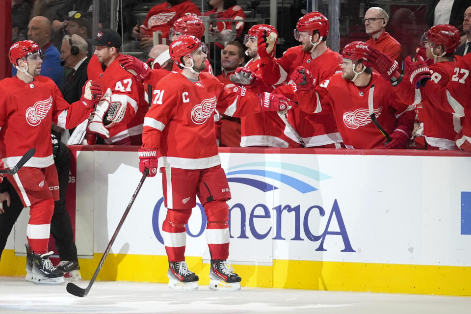 Detroit Red Wings center Dylan Larkin (71) celebrates his goal against the Colorado Avalanche in the third period of an NHL hockey game Thursday, Feb. 22, 2024, in Detroit. (AP Photo/Paul Sancya)