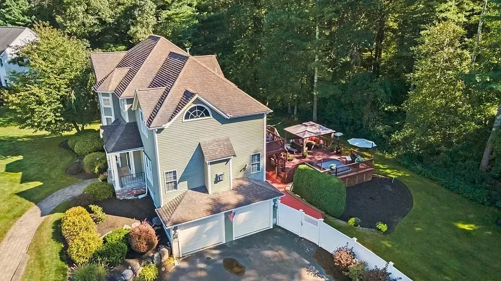 This home at 380 Mohawk Road in Raynham that sold for $949,000, on Sept. 29, 2023, has a vast and private and professionally landscaped backyard and patio, according to the real estate listing.
