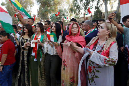 People celebrate to show their support for the upcoming September 25th independence referendum in Kirkuk, Iraq September 11, 2017. REUTERS/Ako Rasheed