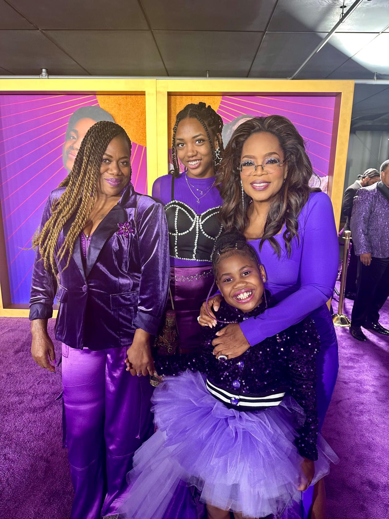 From left: Detroit's Kenya White and her daughters, A'Blesyn Davis and Robin (Rosie) McKee with Oprah Winfrey at the Los Angeles premiere of "The Color Purple" on Dec. 6.
