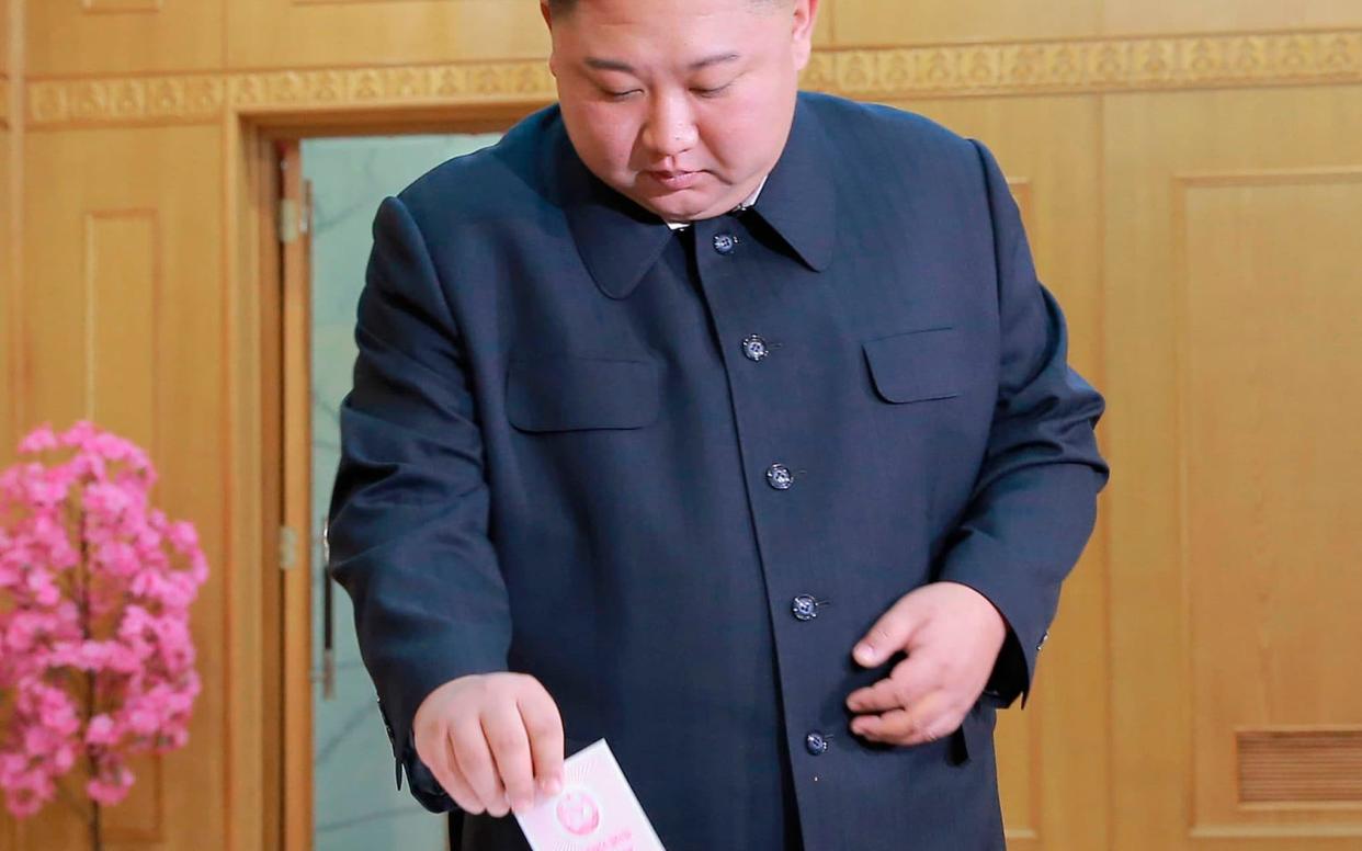 North Korean leader Kim Jong-un casts his vote at a polling centre at Pyongyang's Kim Chaek University of Technology - KCNA via KNS