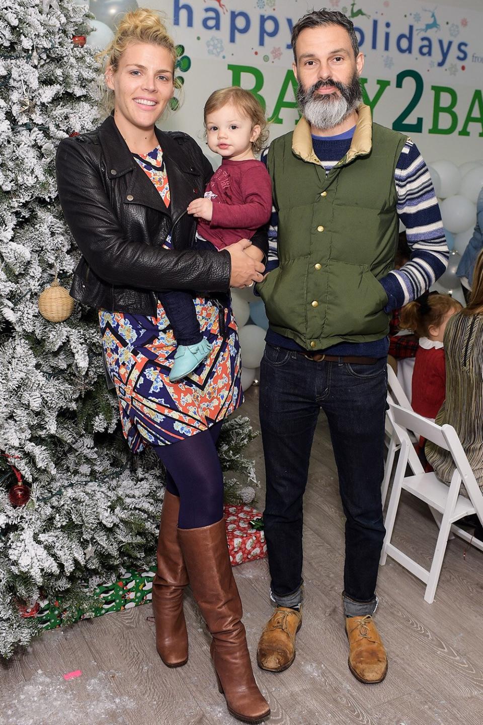 LOS ANGELES, CA - DECEMBER 13: Busy Philipps, Birdie Silverstein and Marc Silverstein attend Baby2Baby Holiday Party Presented By The Honest Company on December 13, 2014 in Los Angeles, California. (Photo by Stefanie Keenan/Getty Images for Baby2Baby)