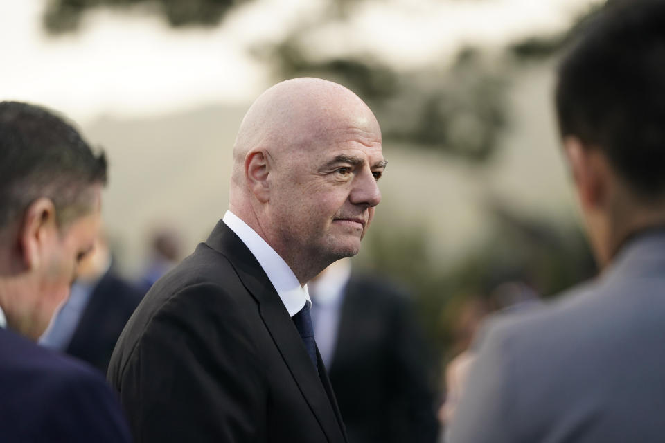 FIFA President Gianni Infantino talks to reporters as he arrives for a ceremony unveiling the official brand of soccer's 2026 World Cup, at Griffith Observatory in Los Angeles on Wednesday, May 17, 2023. (AP Photo/Jae C. Hong)