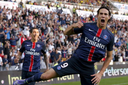 Paris St Germain's Edinson Cavani (R) celebrates after scoring against FC Nantes during their French Ligue 1 soccer match at the Beaujoire stadium in Nantes, France September 26, 2015. REUTERS/Stephane Mahe