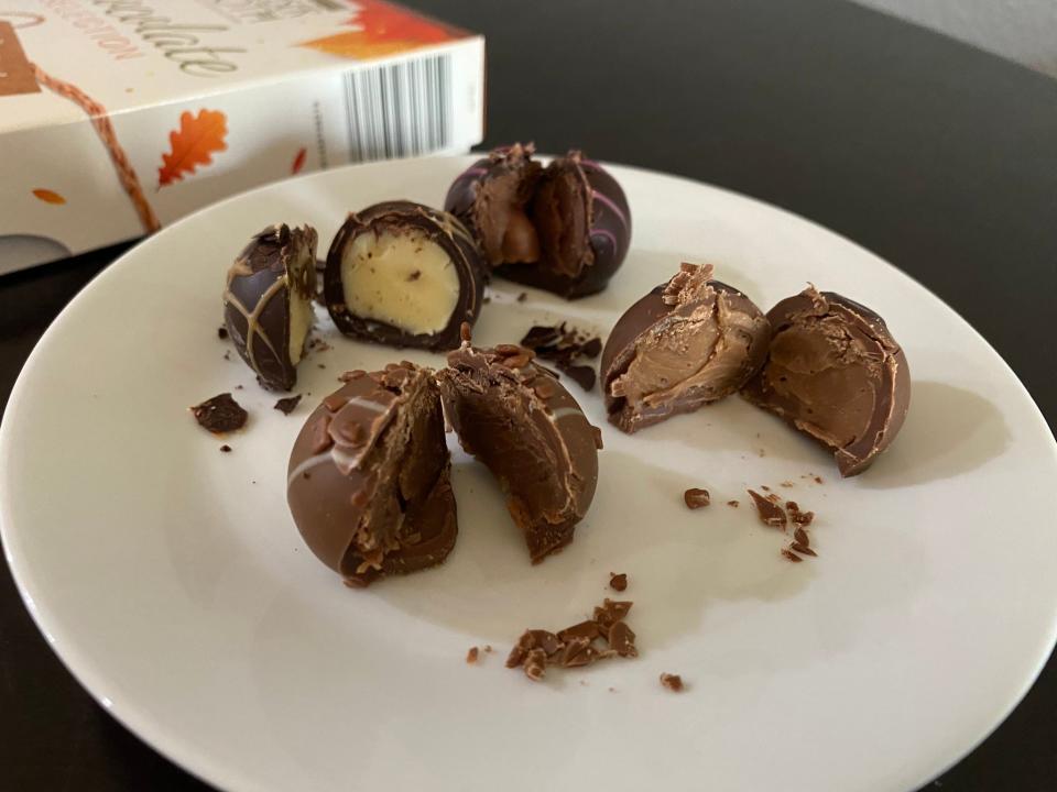 Four Moser Roth autumn chocolate balls cut in half