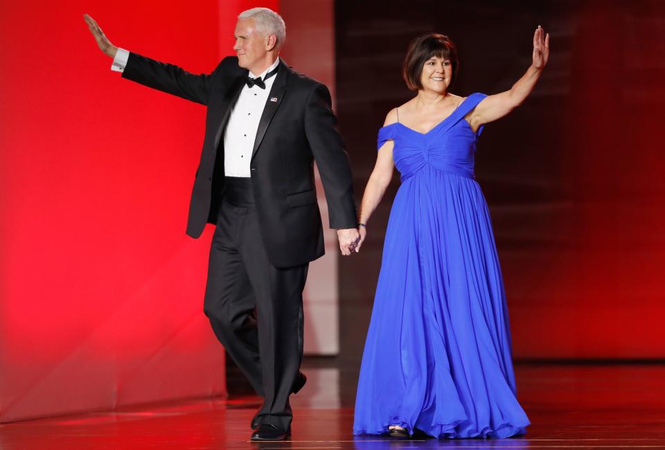Vice President Mike Pence and his wife Karen arrive at the Freedom Inaugural Ball at the Washington Convention Center in Washington.