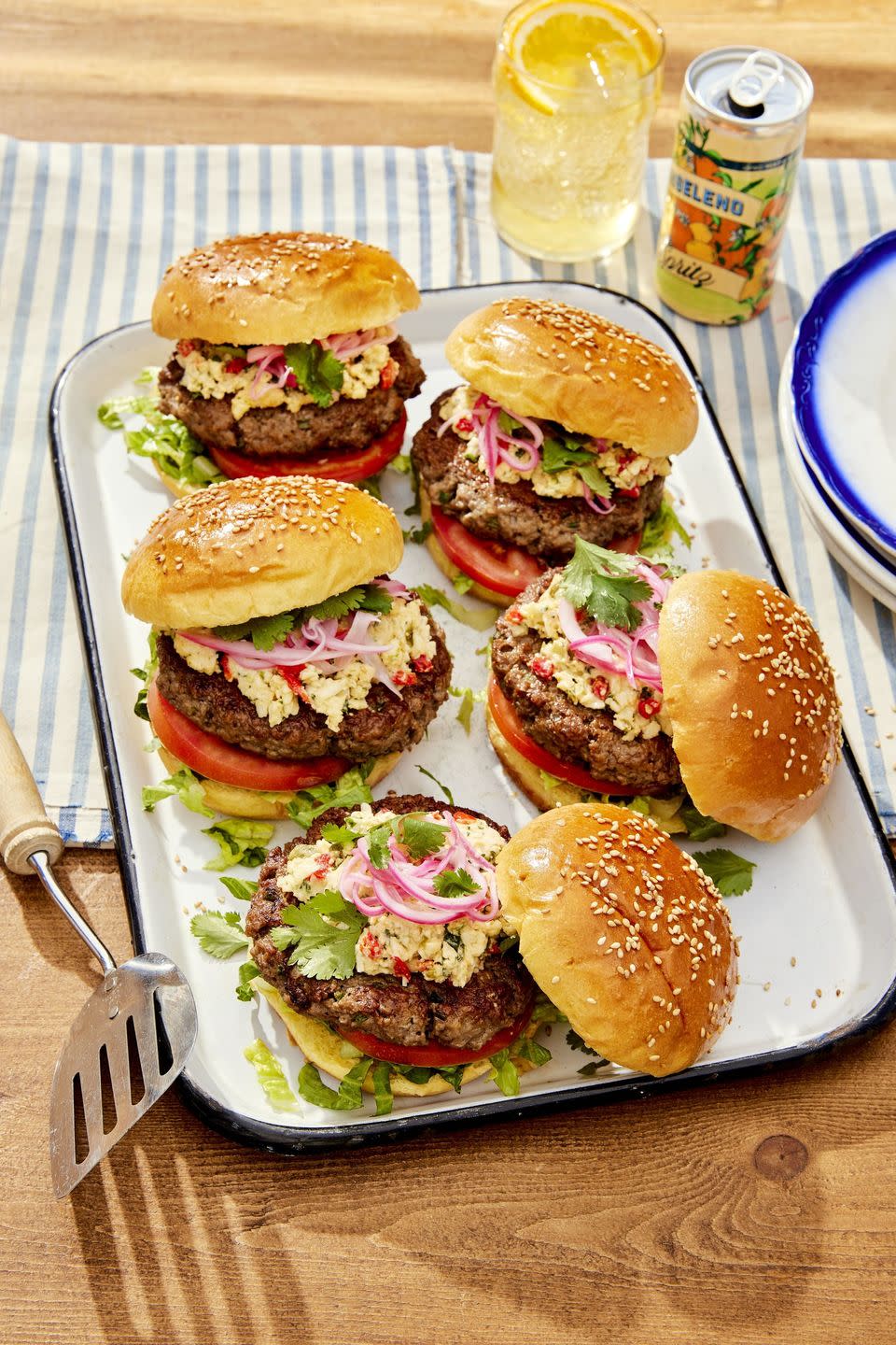 green chile pimento cheese burgers on a white serving tray