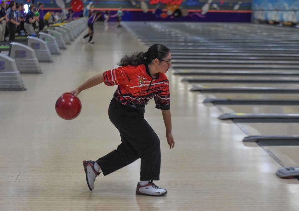 Nancy Roberts, a junior at Port St. Lucie High School, bowls down her lane during team competition in their District 12 Bowling Championship at Superplay USA on Monday, Oct. 25, 2021 in Port St. Lucie. "It's an honor, we've had a really great season so far and hopefully that continues," Roberts said. "It's just a great sport, you meet a lot of great people, and you learn a lot too."