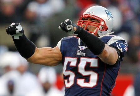 FILE PHOTO - New England Patriots linebacker Junior Seau celebrates sacking San Diego Chargers quarterback Philip Rivers in first quarter of the NFL's AFC championship football game in Foxborough, Massachusetts, U.S. on January 20, 2008. REUTERS/Brian Snyder/File Photo