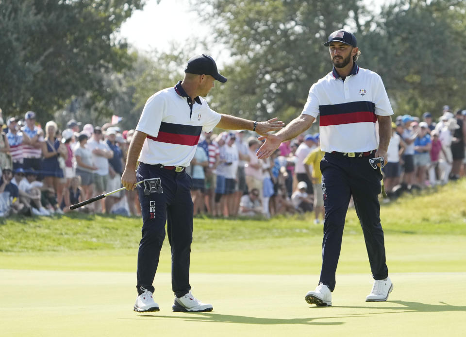 Team USA golfer Brian Harman and Team USA golfer Max Homa walk off the 9th green during day two fourballs round for the 44th Ryder Cup golf competition at Marco Simone Golf and Country Club. Mandatory Credit: Adam Cairns-USA TODAY Sports