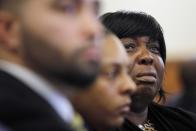 Ursula Ward, mother of Odin Lloyd, reacts as photographs of her son's body are shown as evidence, in the murder trial of former New England Patriots tight end Aaron Hernandez, at Bristol County Superior Court in Fall River, Massachusetts, February 24, 2015. Hernandez is accused of the murder of Odin Lloyd in June 2013. REUTERS/Brian Snyder (UNITED STATES - Tags: CRIME LAW SPORT FOOTBALL)