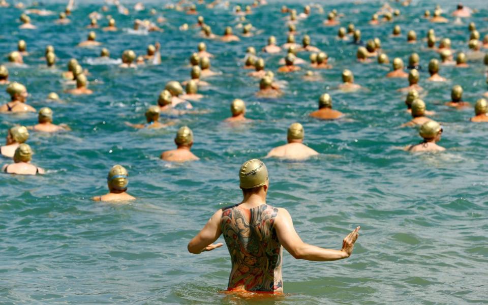 swimmers itch heatwave swim lakes rivers sea heat rash skin summer - Arnd Wiegmann/REUTERS