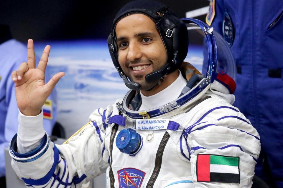 <span class="caption">The United Arab Emirates’ first astronaut, Hazza Al Mansouri, gives an OK sign during a spacesuit check before a launch to the International Space Station.</span> <span class="attribution"><a class="link " href="https://www.gettyimages.com/detail/news-photo/expedition-61-62-main-crew-member-the-united-arab-emirates-news-photo/1171006296?adppopup=true" rel="nofollow noopener" target="_blank" data-ylk="slk:Sergei Savostyanov/TASS via Getty Images;elm:context_link;itc:0;sec:content-canvas">Sergei Savostyanov/TASS via Getty Images</a></span>