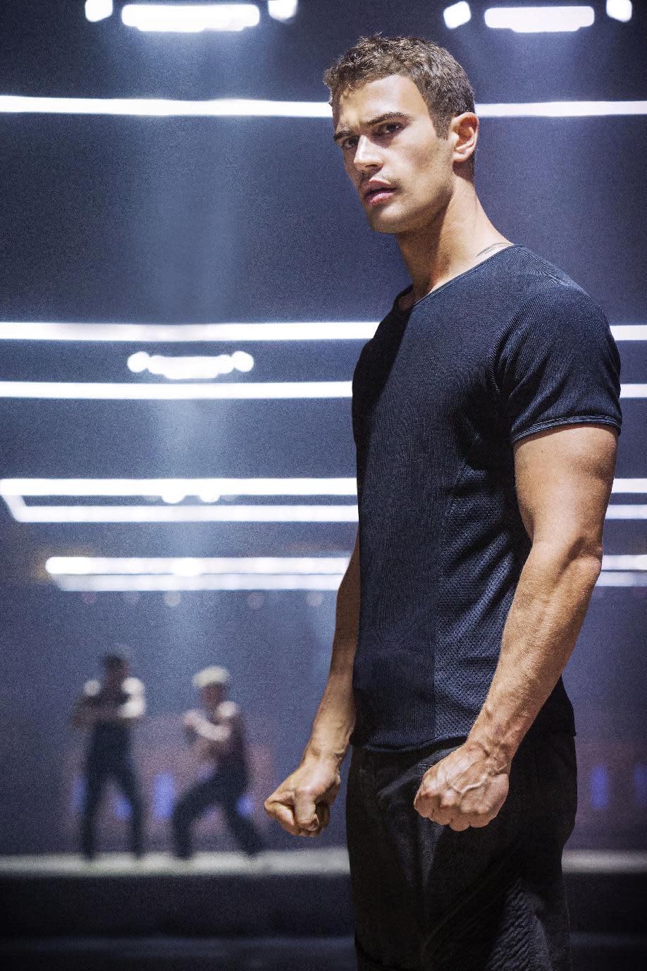 This publicity photo released by Summit Entertainment shows Theo James in a scene from the film, "Divergent." (AP Photo/Summit Entertainment, Jaap Buitendijk)