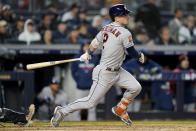 Houston Astros Alex Bregman (2) follows through on a base hit to drive in a run against the New York Yankees during the seventh inning of Game 4 of an American League Championship baseball series, Sunday, Oct. 23, 2022, in New York. (AP Photo/John Minchillo)