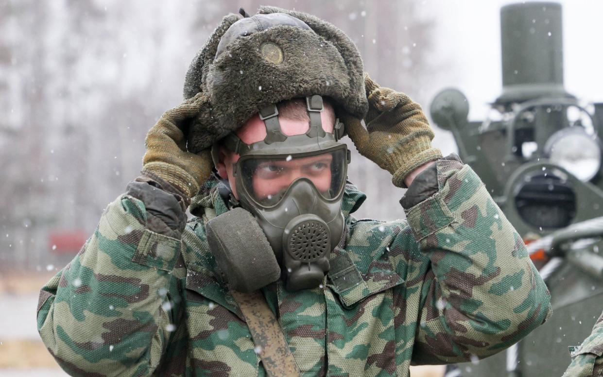 A cadet in a gas mask