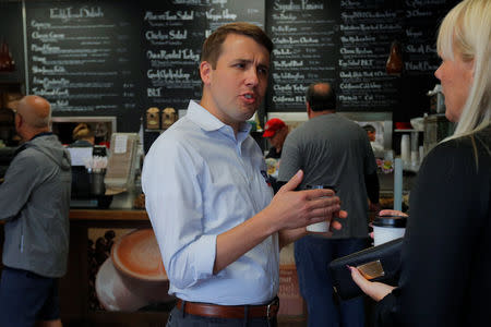 Democratic candidate for the U.S. Congress Chris Pappas greets voters at the Bridge Cafe ahead New Hampshire's primary election in Manchester, New Hampshire, U.S., September 10, 2018. REUTERS/Brian Snyder