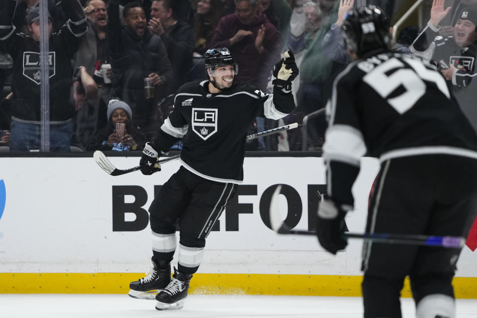 Los Angeles Kings left wing Kevin Fiala, left, celebrates after his goal during the second period of an NHL hockey game against the New Jersey Devils, Sunday, March 3, 2024, in Los Angeles. (AP Photo/Ryan Sun)
