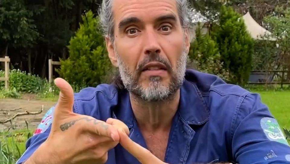 Russell Brand revealed on social media Bear Grylls helped to baptise him in the River Thames last week (Russell Brand)