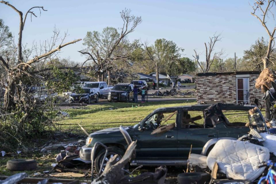 Homes and vehicles were damaged after a tornado roared through Mississippi.