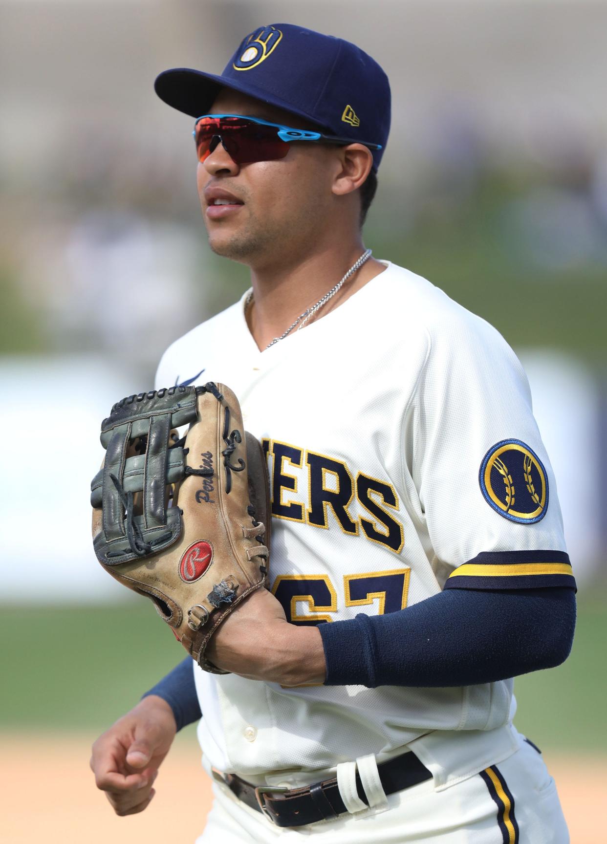 Milwaukee Brewers outfielder Blake Perkins makes his way to the dugout after making a catch in center field, during their game against the Chicago Cubs, Tuesday, February 28, 2023.(Photo/Roy Dabner)