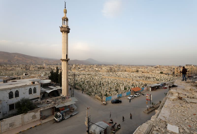 A general view shows a cemetery in Douma