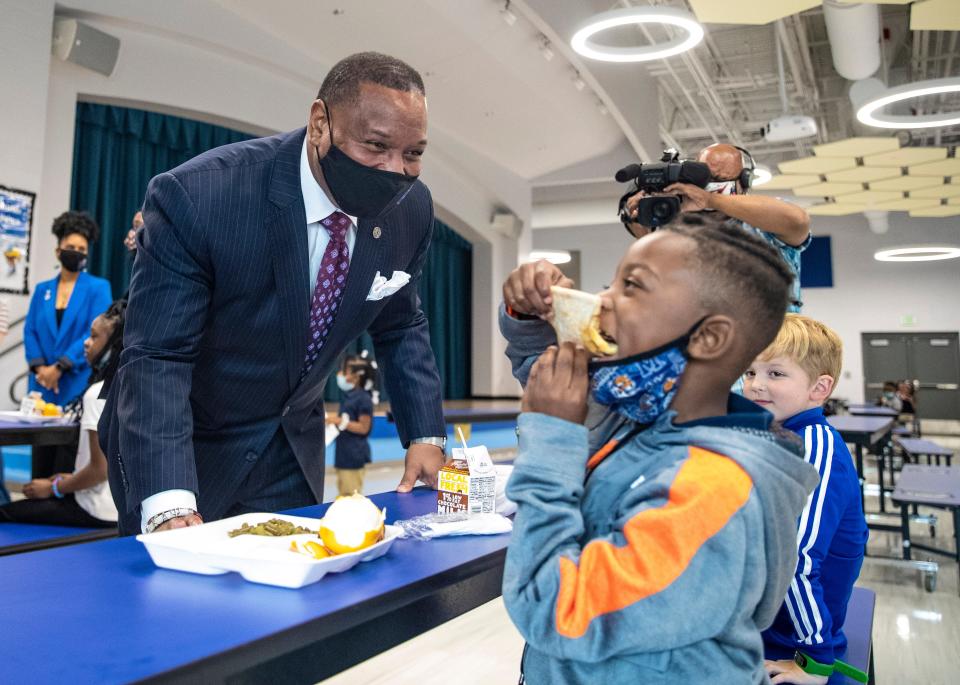 Superintendent Joris Ray and 1st-grade student Rilei Harris talk at such during a building tour of Alcy Elementary School in Memphis, Tenn., on Wednesday, April 7, 2021.