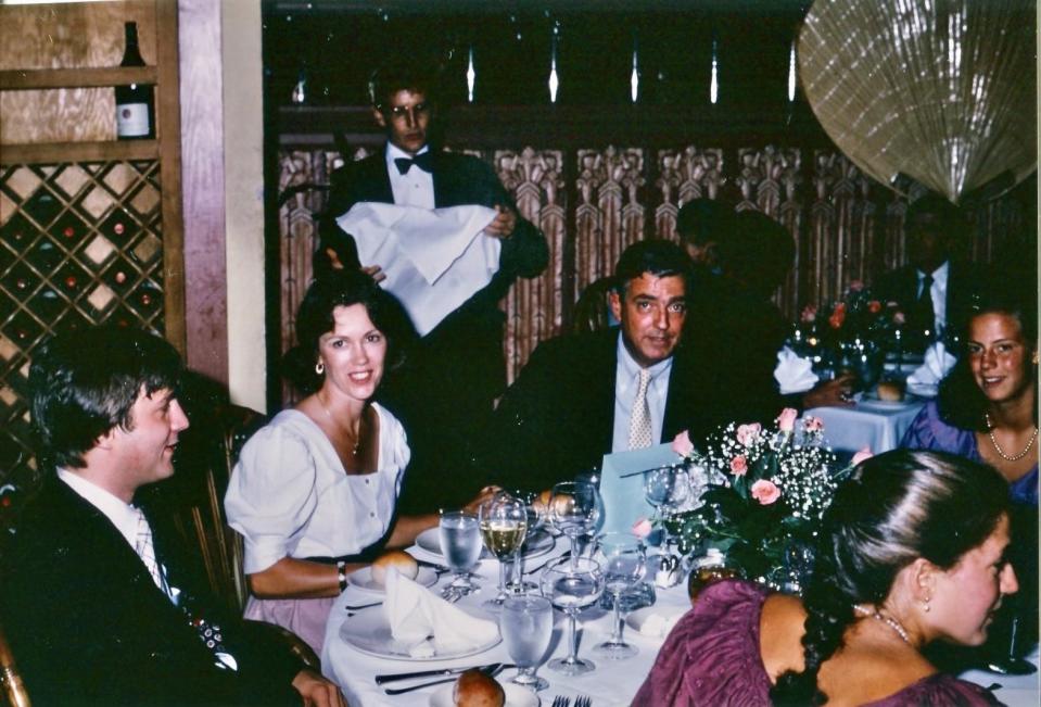 Nancy and Charlie Keller, second and third from left, celebrate their 25th anniversary dinner Aug. 9, 1982, at the Market Place Restaurant in downtown Asheville.