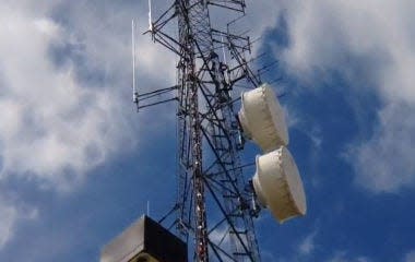 A cell tower rises over the Bucks County emergency communications center in Ivyland.