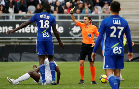 Soccer Football - Ligue 1 - Amiens SC v RC Strasbourg - Stade de la Licorne, Amiens, France - April 28, 2019 Strasbourg's Ibrahima Sissoko is shown a yellow card by referee Stephanie Frappart REUTERS/Pascal Rossignol