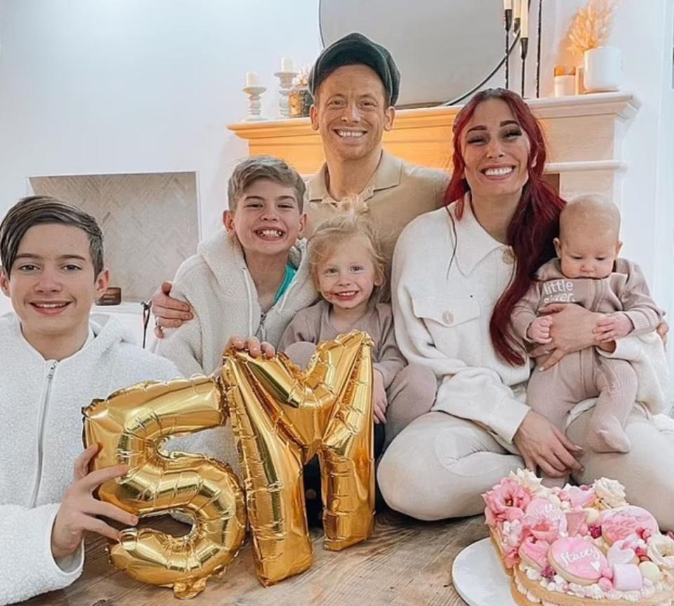 The presenter pictured with Swash, their kids Rex and Rose as well as her sons Zach and Leighton from previous relationships (Instagram/Stacey Solomon)