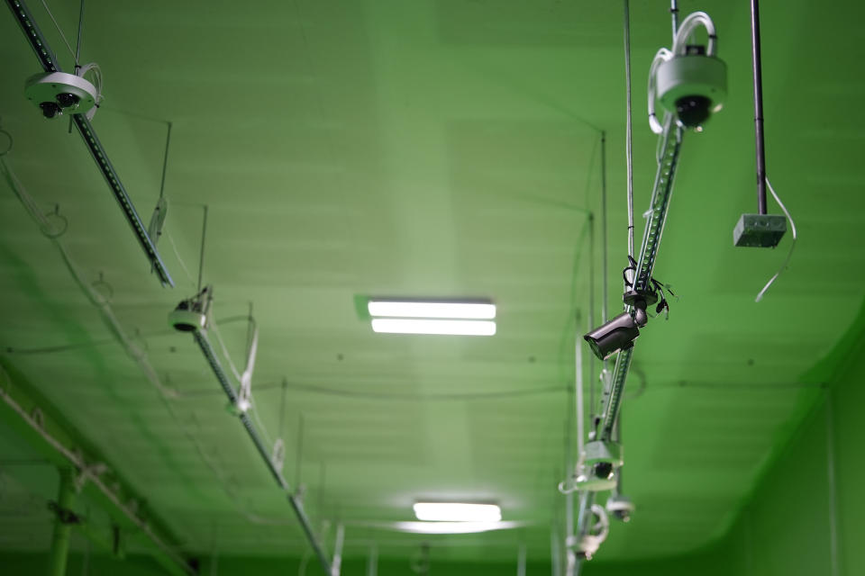 Security cameras are seen at ZeroEyes' greenscreen lab for testing and training artificial intelligence to spot visible guns, Friday, May 10, 2024, in Conshohocken, Pa. (AP Photo/Matt Slocum)