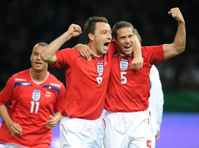 England’s Matthew Upson celebrates scoring with John Terry during a friendly victory over Germany in November 2008
