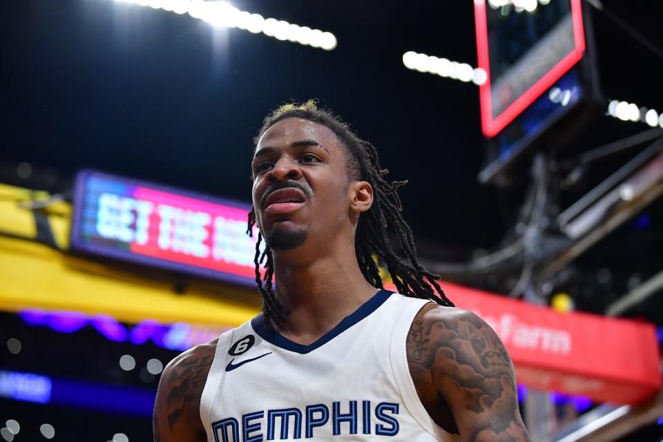 Memphis Grizzlies guard Ja Morant  reacts after scoring a basket against the Los Angeles Lakers during Game 4 of their NBA playoffs series at Crypto.com Arena.