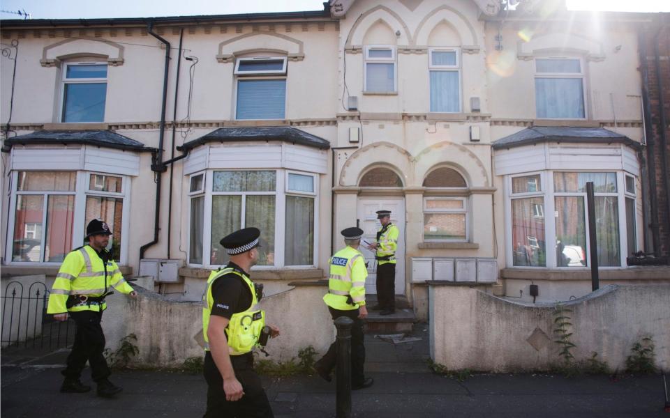 Police raid a house in Egerton Crescent, in the Withington area of Manchester - Credit: David Rose