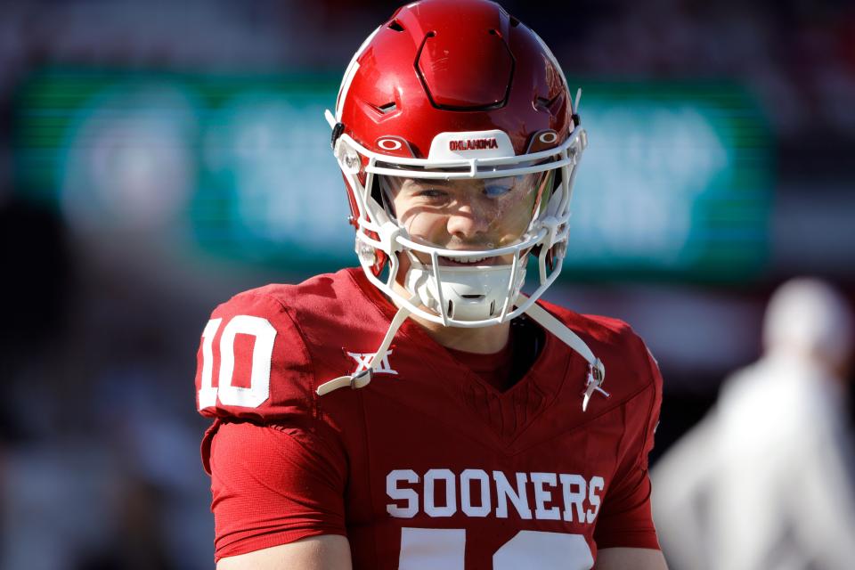 Oklahoma quarterback Jackson Arnold warms up before a 69-45 win over TCU in Norman, Okla., Friday, Nov. 24, 2023.