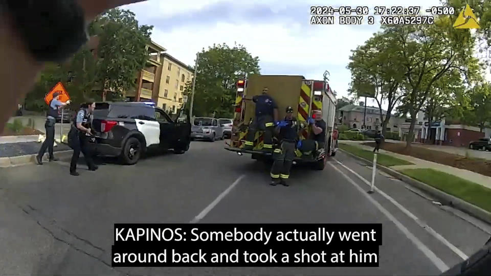 Frames from body-camera video released show officers responding to a shooting in which Minneapolis Police Officer Jamal Mitchell was killed along with three others, including the gunman, May 30, 2024, in Minneapolis, Minn. (Minneapolis Police Department via AP)