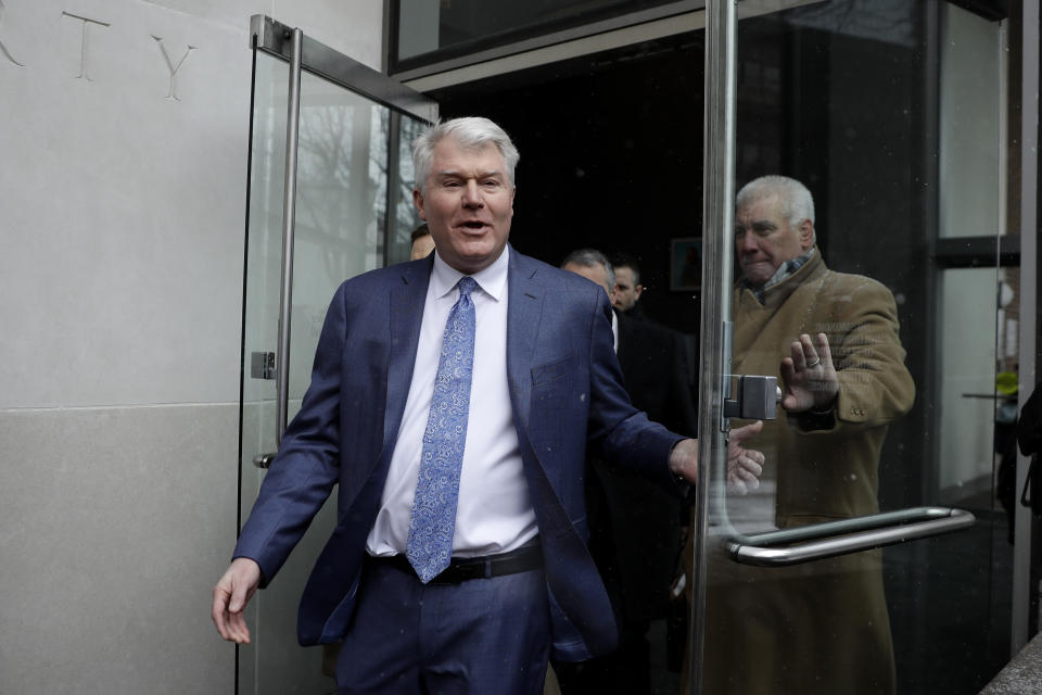 FILE - Johnny "Doc" Dougherty departs the federal courthouse in Philadelphia, in this Friday, Feb. 1, 2019, file photo. Philadelphia labor leader Johnny "Doc" Dougherty goes on trial Monday, Oct. 4, 2021, in a City Hall corruption case that accuses him of keeping Councilman Bobby Henon on the union payroll to push his agenda. Dougherty, a powerful figure in Pennsylvania politics, faces a second trial over union activities.(AP Photo/Matt Slocum, File)