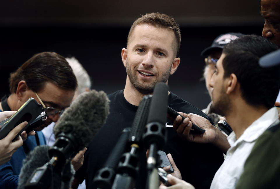 Dallas Mavericks' J.J. Barea responds to questions during an NBA basketball news conference in Dallas, Thursday, April 11, 2019. (AP Photo/Tony Gutierrez)